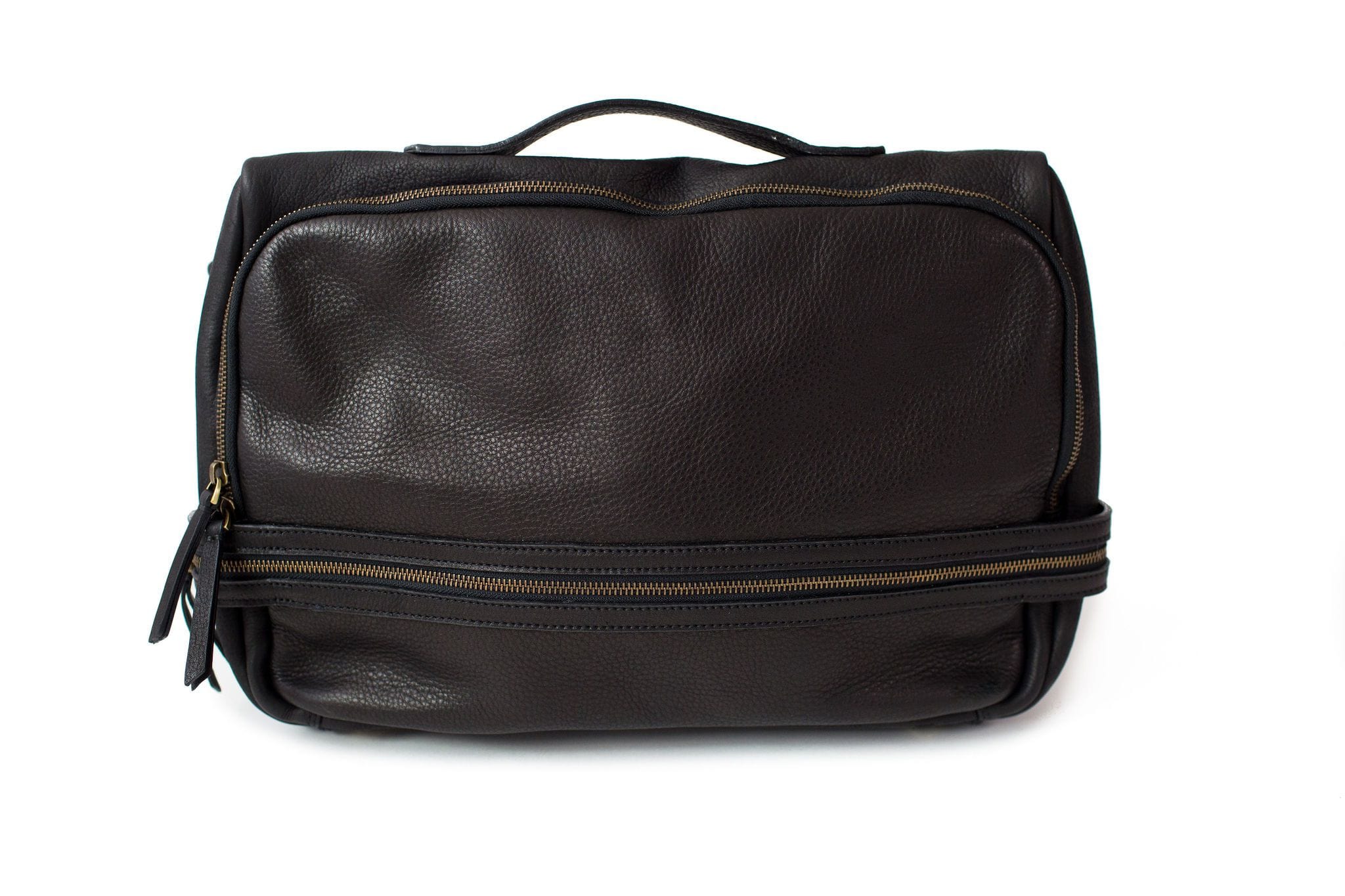 The Rapinoe unisex messenger bag in black raw leather has a classic, minimal design with two main zipper compartments.