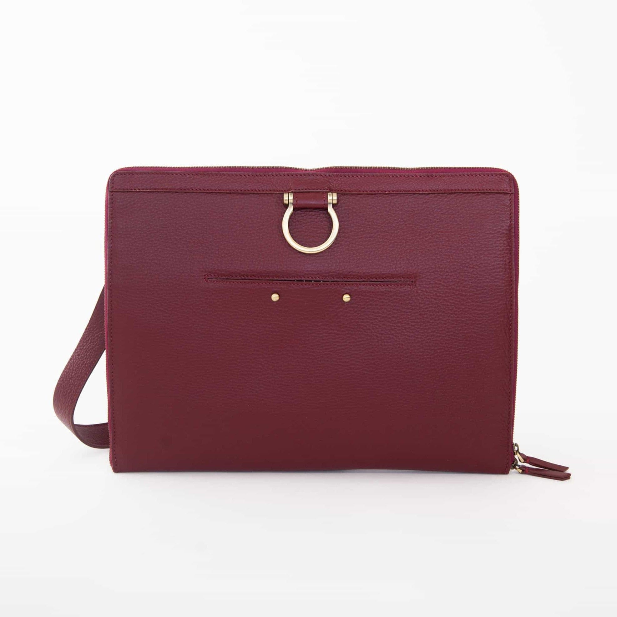 The M XL crossbody bag in deep red oil leather has a zip enclosure, front exterior stud pocket, and Omega hardware.