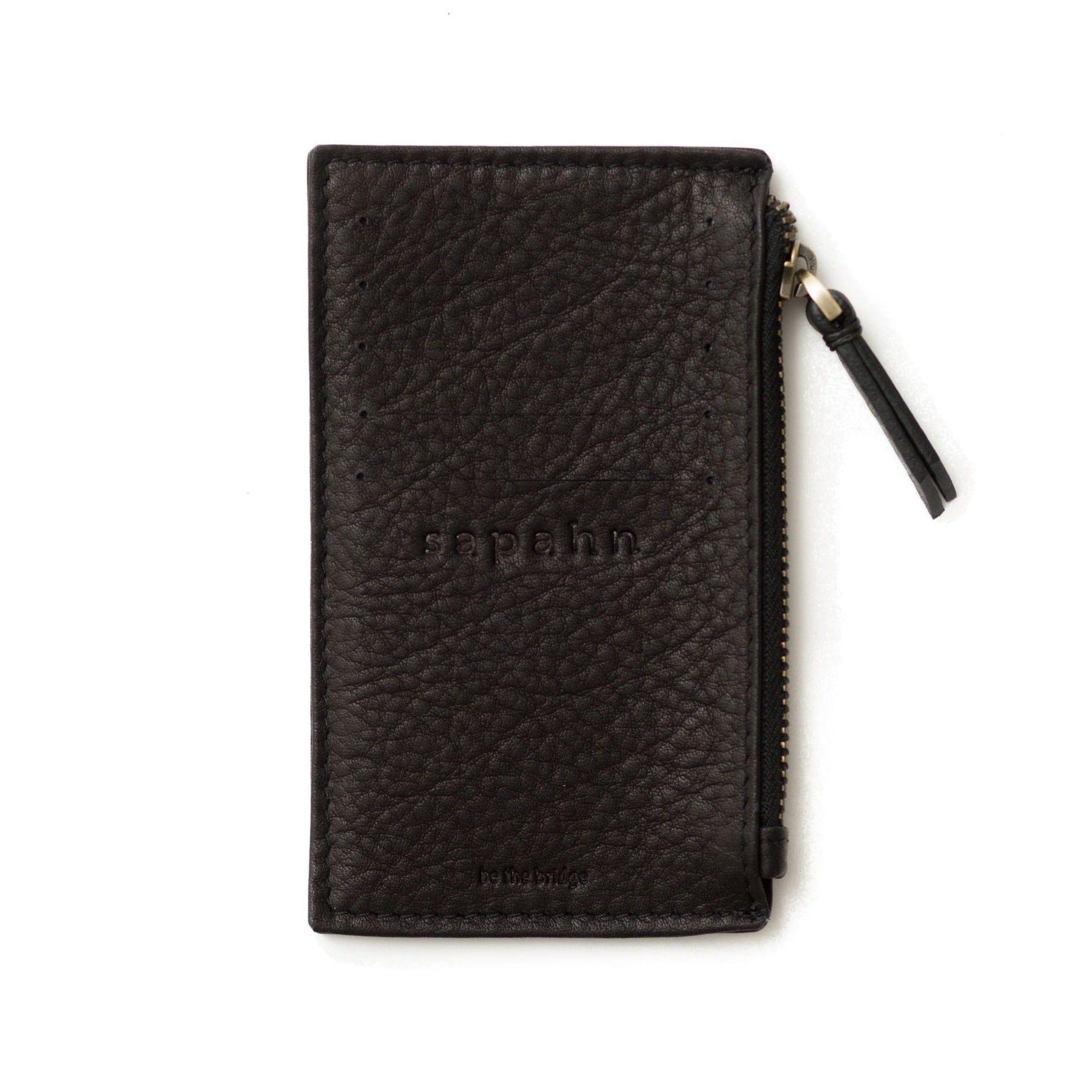 Black raw leather Emma card holder wallet features 5 external card slots and a subtle Sapahn logo.