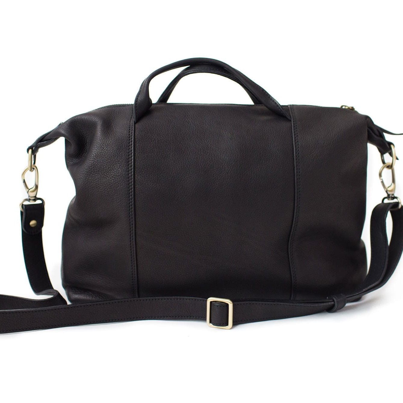 The back of the Linda Jean handbag in black raw leather has clean lines. Removable, adjustable strap.