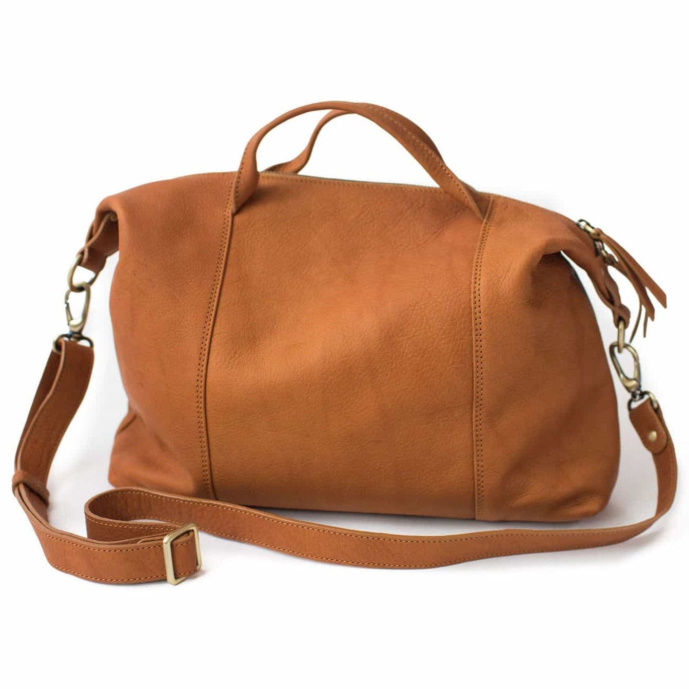 The back of the Linda Jean handbag in whisky tan raw leather has clean lines. Removable, adjustable strap.