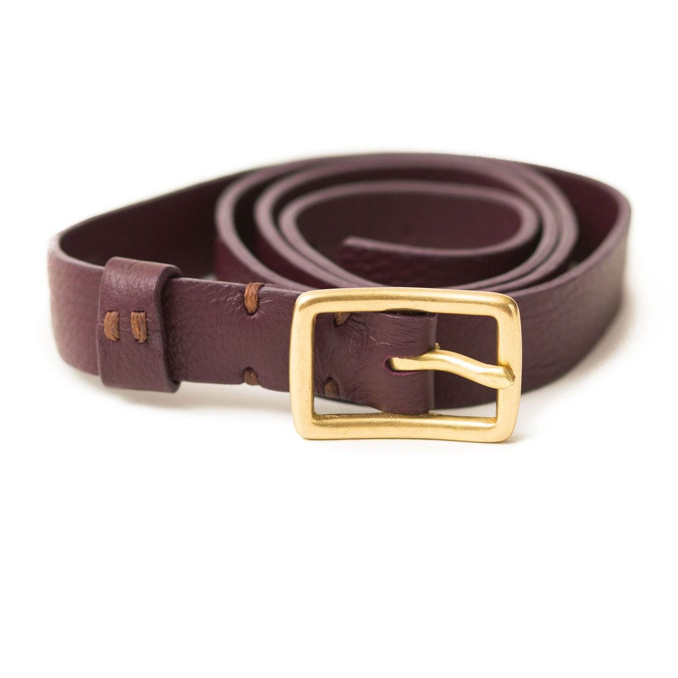 The Rosa belt in biking red oil leather is a classic style with a brass belt buckle.